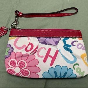 Coach Poppy Daisy Multicolor Floral Wristlet with Pink Trim